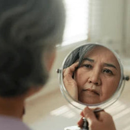You avoid mirrors in harsh lighting. You stopped taking photos at family events.